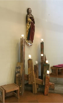 "ave" Candle design with street children, Wood left over from kindergarten construction Gera-Lusan